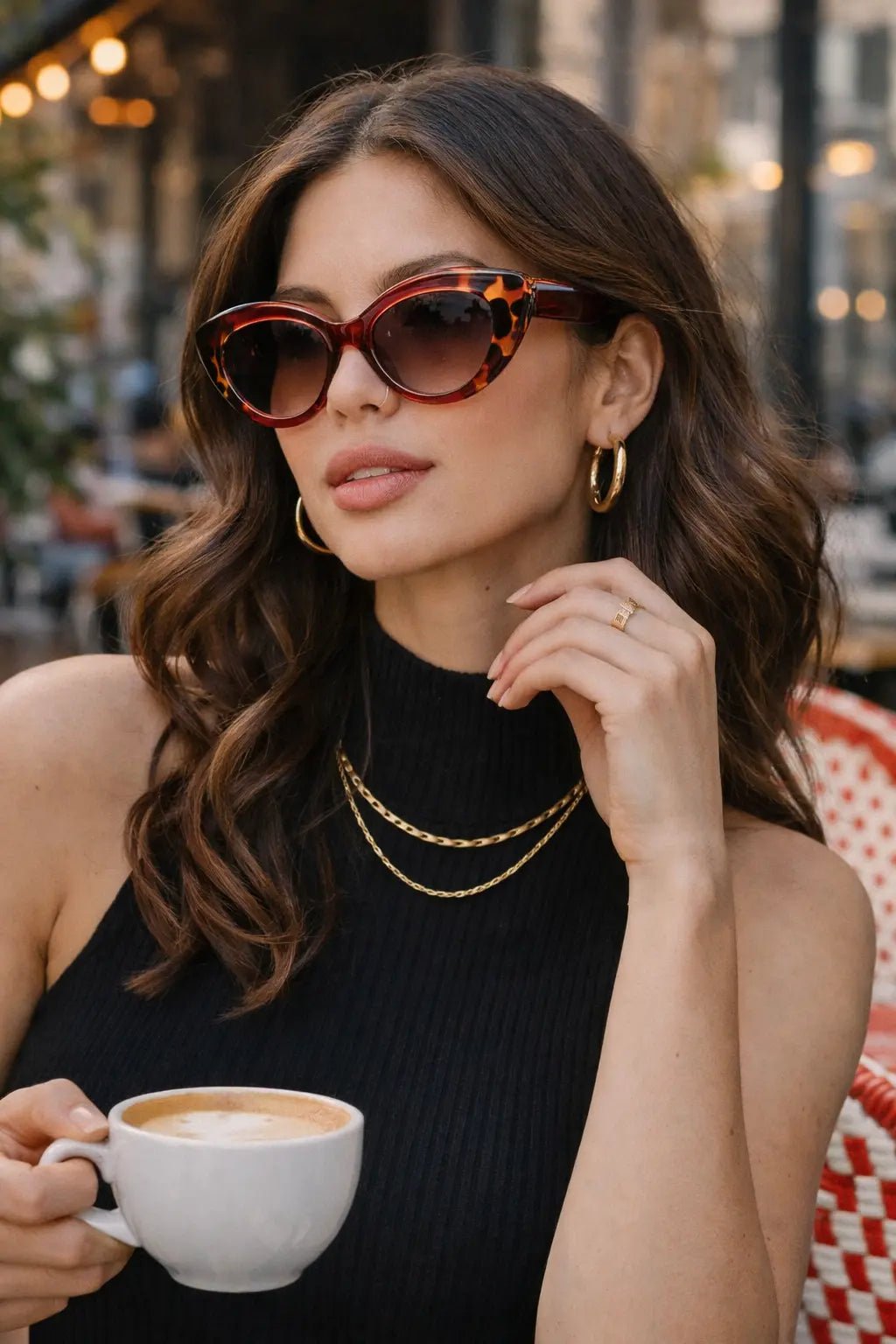Model wearing Betty’s Retro Shades June sunglasses in marbled brown