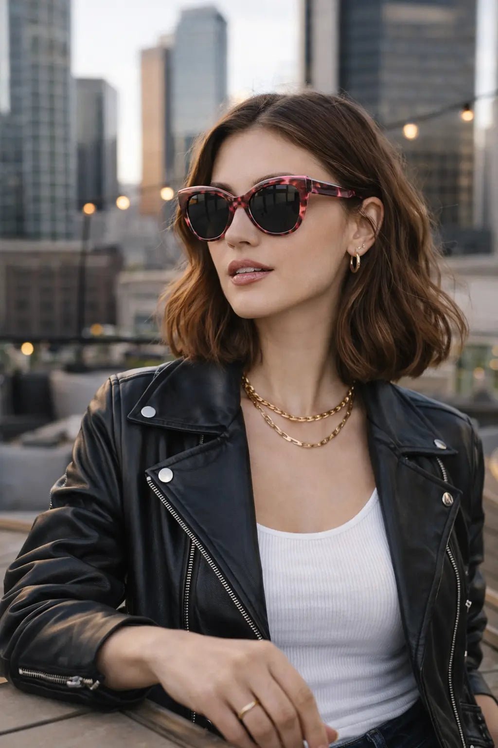 Model wearing Betty’s Retro Shades Kitty sunglasses in marbled rose