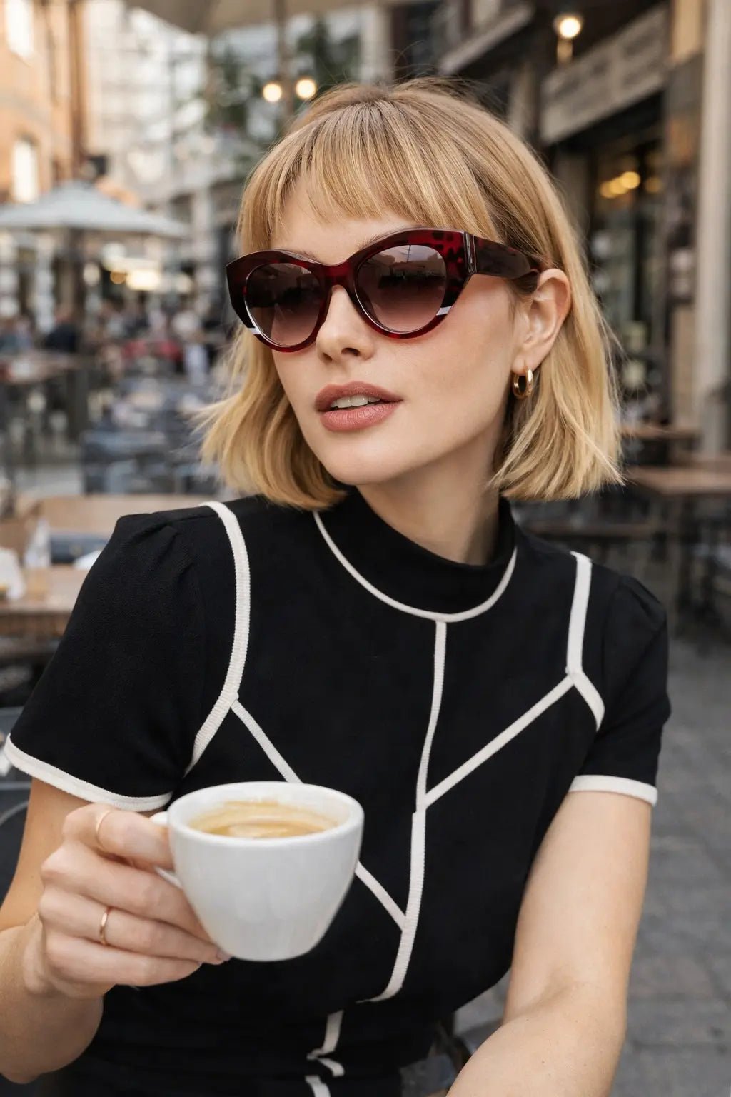 Model wearing Betty’s Retro Shades Marilyn sunglasses in marbled brown
