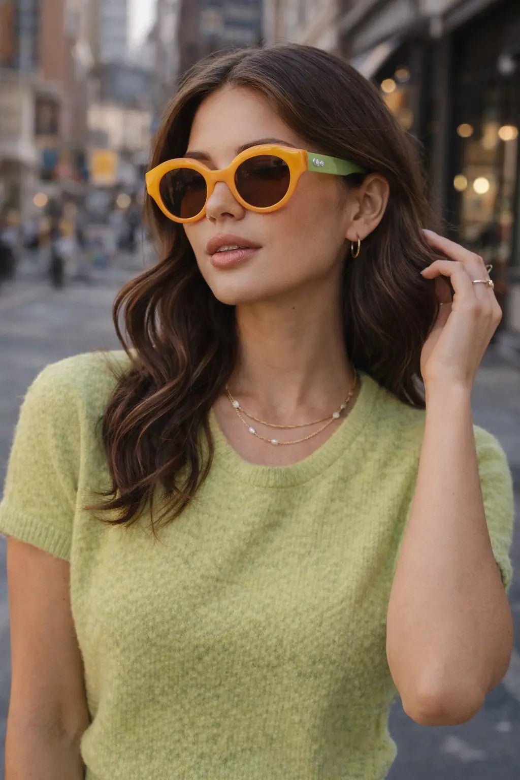 Model wearing Betty’s Retro Shades Posey sunglasses in honey
